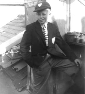 An optimistic start in my new Latymer uniform and first long trousers